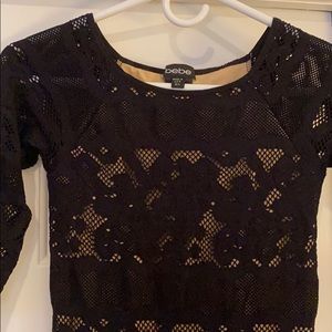 Black lace over a nude base size m/l Bebe dress